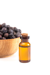 Juniper Berry Essential Oil Isolated on a White Background