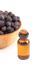 Juniper Berry Essential Oil Isolated on a White Background