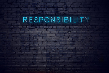 Brick wall and neon sign with text responsibility - obrazy, fototapety, plakaty