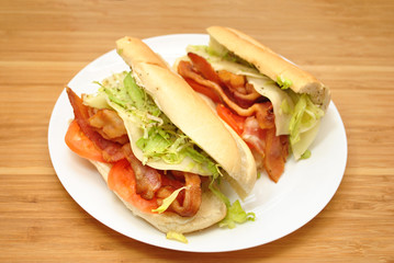 Bacon, Lettuce, & Tomato Deli Sandwich on a White Plate