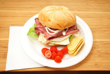 Roast Beef & Turkey Deli Sandwich on a White Plate