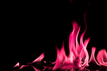 Abstract chemical pink fire flame isolated on black background.