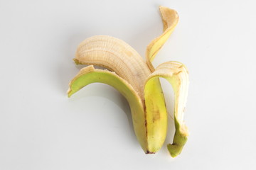 open banana on white background