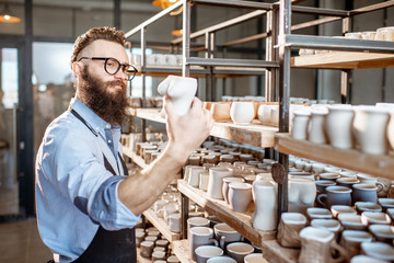 Worker at the warehouse of the pottery