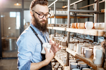 Worker at the warehouse of the pottery