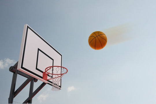 Scoring Basketball, shooting in the ring, 3d rendering with copy space. Concept image for target and goal.