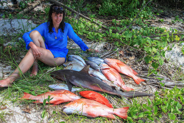 sea fishing in the Seychelles, caught catch - red perch, shark, Campeche snapper, barracuda