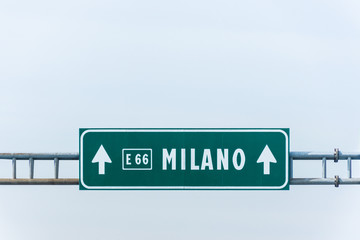 Highway road sign to Milano, Italy