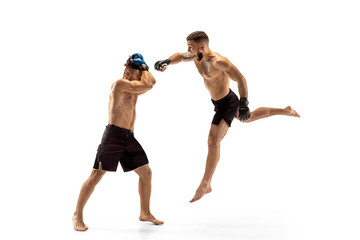 Two professional boxers boxing isolated on white studio background