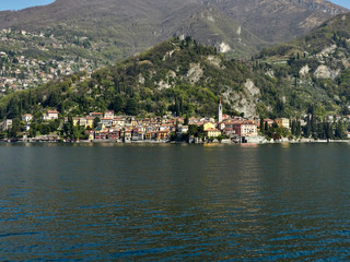 Fototapeta na wymiar Varenna, Italy March 30 2019 Far Frontal Lanscape view of Varenna Town at Lake Como Italy