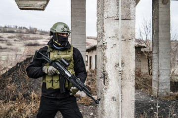 SWAT anti terrorist soldier special police force holding the rifle on the mission battle