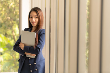 Young business woman with modern office ,nature background