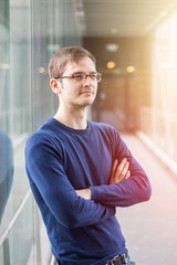 Portrait picture of a young business man, indoors