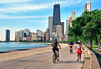 Jogger and cyclists in Chicago along the Lake Michigan shoreline