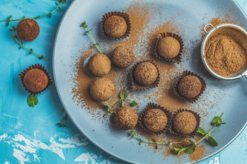 Cocoa balls, handmade chocolate balls cakes in a blue tray