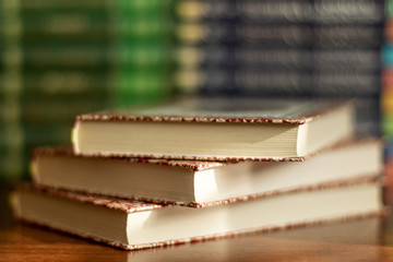 Stack of varied books many books piles on background with copyspace