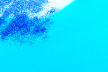 blue glitter shiny background in the cporner sunshine space for text