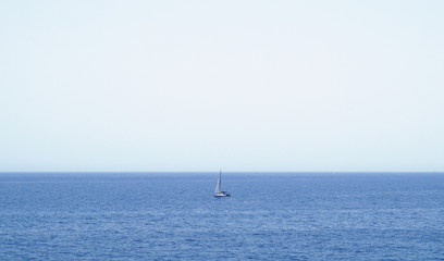 Lonely sailboat on the sea