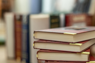 Stack of varied books many books piles on background and copyspace
