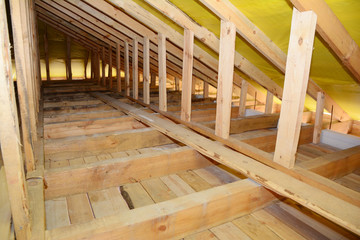 Roofing Construction Interior. Wooden Roof Beams,  Frame House Attic Construction.