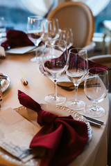 Autumn location, autumn decor, rocking chairs. Wedding party family love concept. Candles on the table. Beautiful wedding table decoration. Autumn wedding concept