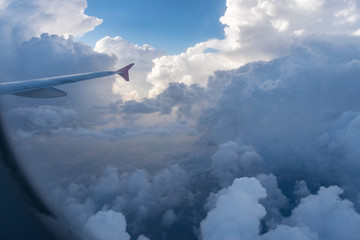 View from airplane window of thunderstorm clouds over central Germany