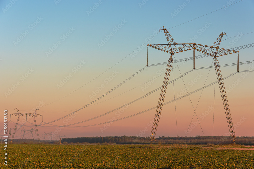 Wall mural View of electrics, electric lines on the background of blue sky and good weather.	