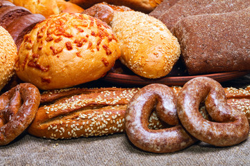 Fresh bread and bakery in the form of background, close-up and with selective focus