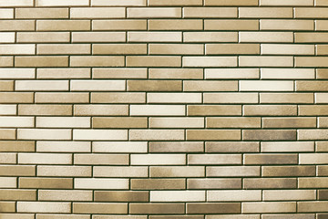 Old beige and white brick wall background texture