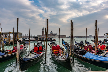 Gondolas moored in Piazza San Marco with San Giorgio Maggiore church in the background