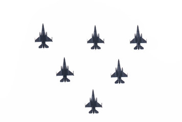 Squadron of military planes compound of six modern fighter jets against white sky. Concept of war, air defense and attack.   - Powered by Adobe