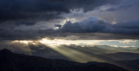 Fototapeta premium Sunset or sunrise with clouds on the mountain