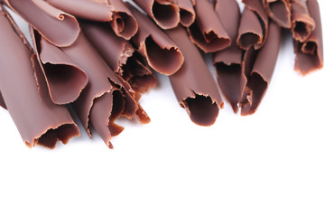 Chocolate shavings on white background