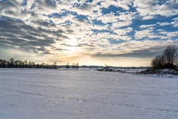 Empty Countryside Landscape in Sunny Winter Day with Snow Covering the Ground, Abstract Background