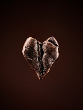 Coffee bean against brown background