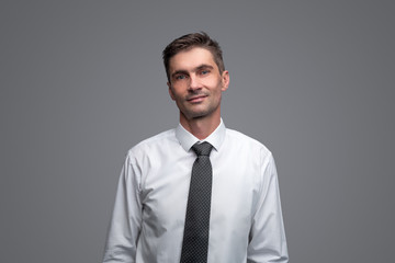 Confident businessman looking at camera