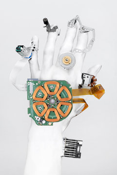 Close Up Of Robot's Hand Against White Background