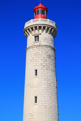 Fototapeta na wymiar Lighthouse Saint Louis in Sete, a seaside resort and singular island in the Mediterranean sea, it is named the Venice of Languedoc Rousillon, France