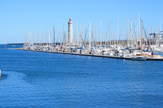 Port and Lighthouse Saint Louis in Sete, a seaside resort and singular island in the Mediterranean sea, it is named the Venice of Languedoc Rousillon, France