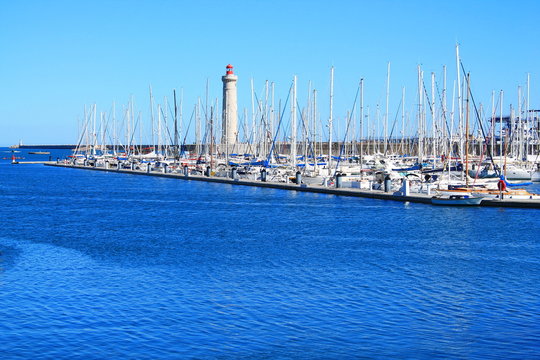 Port and Lighthouse Saint Louis in Sete, a seaside resort and singular island in the Mediterranean sea, it is named the Venice of Languedoc Rousillon, France