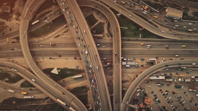Aerial Top View of Epic City Highway Car Traffic System. Busy Road Junction Street Route Vehicle Motion Overview. Business District Transport Development Travel Concept. Drone Flight Footage 4K (UHD)