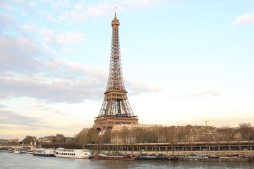 Fototapeta premium Beautiful sky over the Eiffel tower and river seine, Paris capital and the most populous city of France