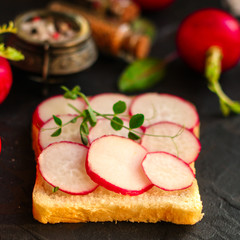 radish, sandwich vegetables and microgreen (snack). food background. top view