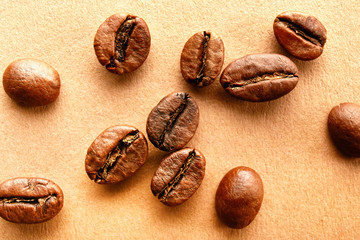 Scattered coffee beans frame design on copy space background.