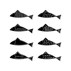 Fish silhouettes with decorated ornaments. Vector.