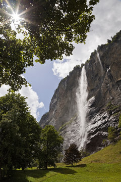 View of Staubbach Falls against cloudy sky