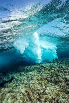 View of wave breaking on coral reef