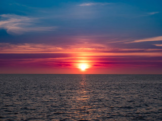 Fototapeta premium Sunset over Surin Beach in Phuket, Thailand