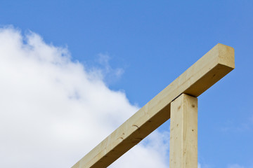 Roof structure in the new house. Bolting of wooden beams.