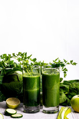 Healthy smoothie for breakfast with green spinach and apple.